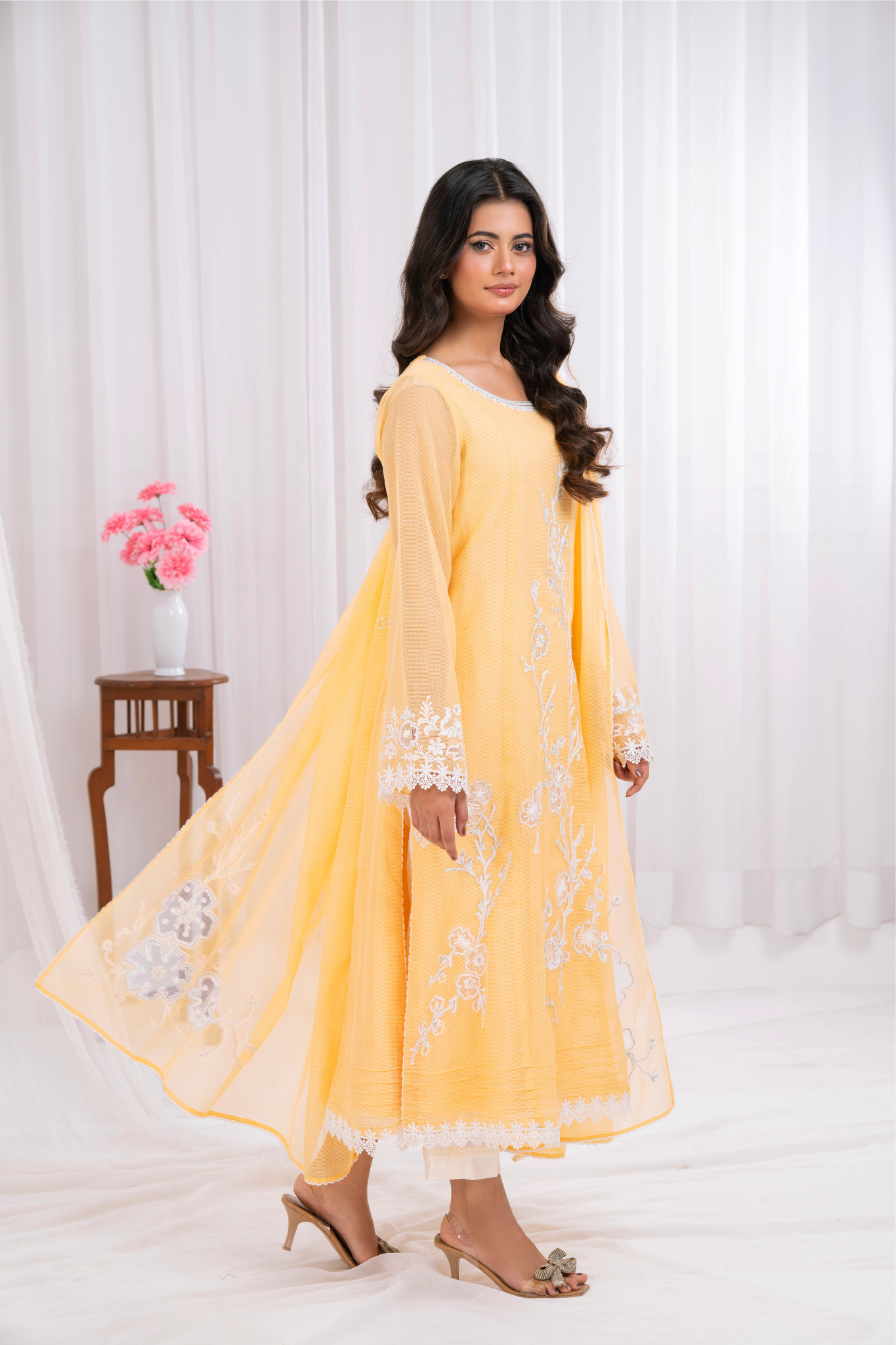 Lemon yellow khaddi net with arri work embroidery