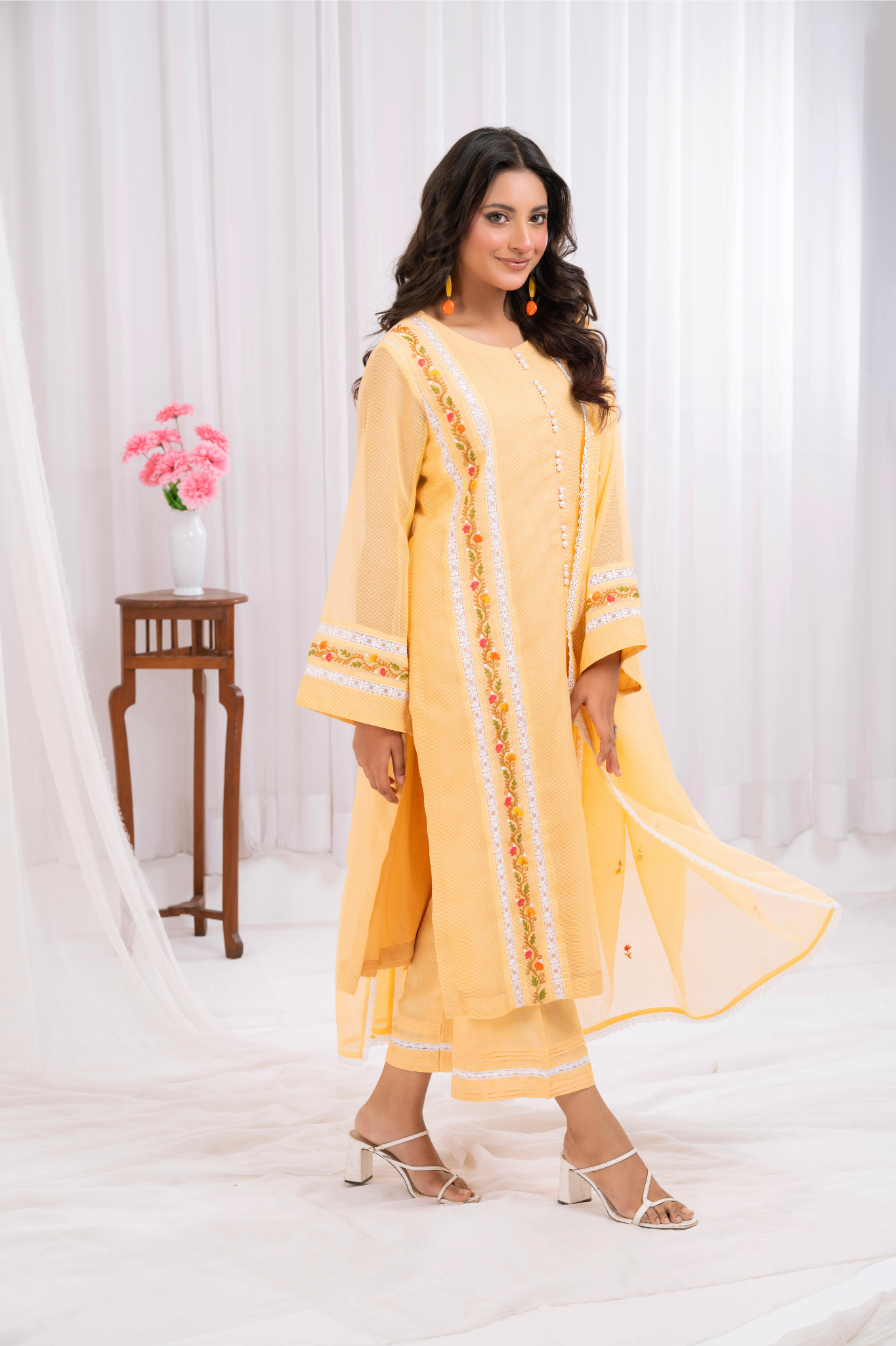 Lemon yellow khaddi net with arri work embroidery
